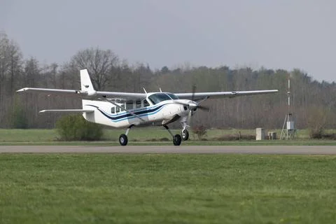 Single-engine business airplane during take off Single-engined propeller b... Stock Photos