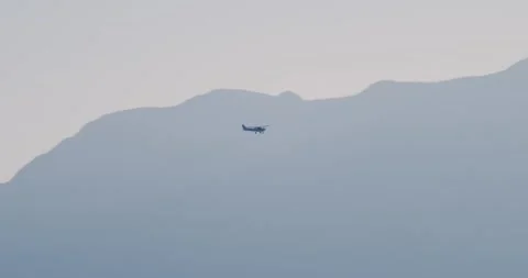 Single Engine Plane Flying Against Sandia Mountains Stock Footage 292718507