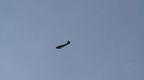 Single-engine plane passes combat training Video stock 57640972