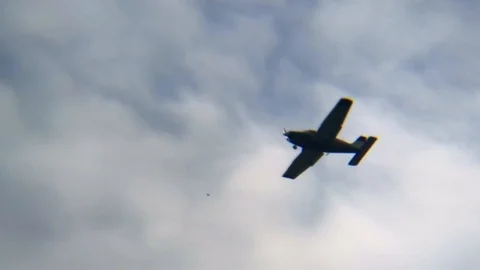 Single Engine Plane Silhouette in Slow Motion Stock Footage 126653613