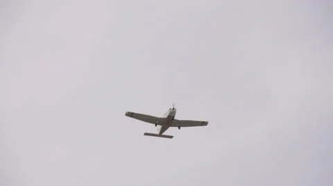 Single engine private plane flying overhead 1 Stock Footage 53353648