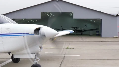 Single engine propeller airplane is stan... | Stock Video | Pond5