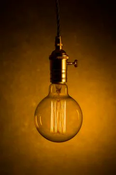 Single filament light bulb Stock Photos