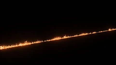 Single Fire Trail. Burning Trail. Fire Trail on Road Stock Footage 250934146