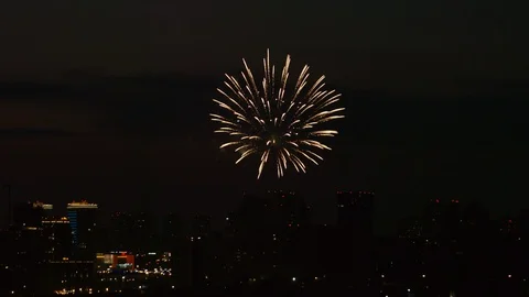 Single firework over a night city Stock Footage 123952054