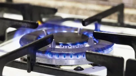 A Single Flame Dancing on a Stovetop Stock Footage 279409726