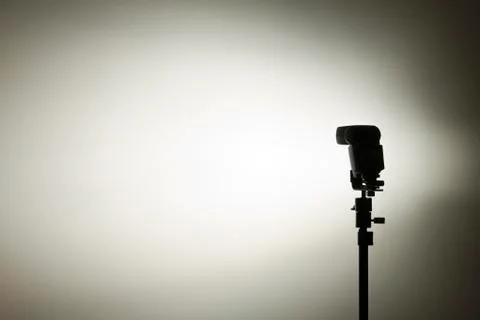 Single flash-light against screen in photo-studio Stock Photos