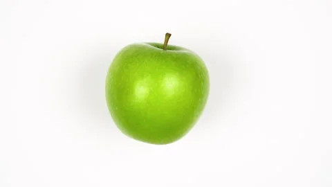 Single Fresh Green Apple Rotating On White Background Studio Shot 4K Stock Footage 321866977