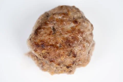 Single fried cutlet on white background closeup macro study of goldenbrown .. Stock Photos