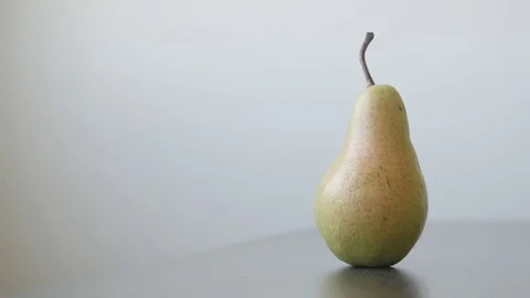 Single fruit from genus Pyrus Stock Footage 84144598