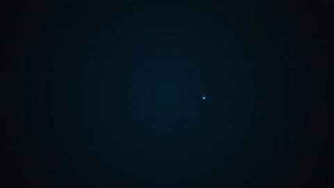 A single glowing blue light dot isolated against a deep dark background Stock Footage 339616524