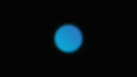 A single glowing blue orb centered against a deep black background Stock Footage 339617188