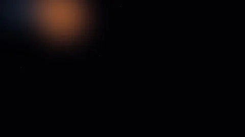 A single glowing orange orb floating in the deep darkness of outer space Vídeos de archivo 338311996