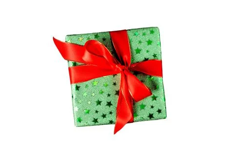 Single green gift box with red ribbon bow isolated on white background. Gift Stock Photos