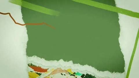 A single green torn paper scrap rests on a matching green background	 Stock Footage 273982782