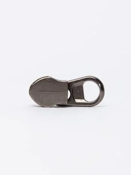 Single gunmetal zipper pull angled view Stock Photos