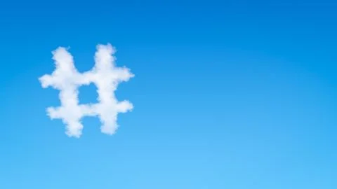 Single Hash Symbol Shaped Cloud in the Blue Sky with Copyspace Illustrazione stock