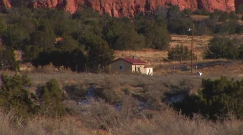 Single house at base of mountain Stock Footage 60737101