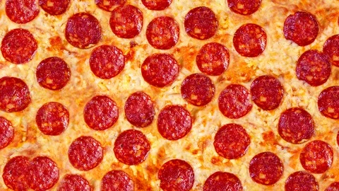 Single image of a pepperoni pizza. Background video. Stock Footage 96689979