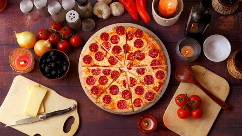 Single image of a pepperoni pizza. Background video. Stock Footage 115542169