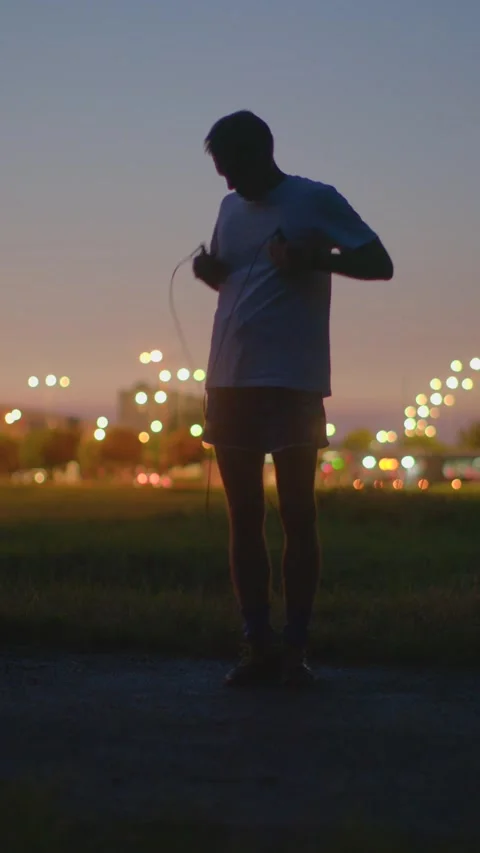Single individual undertakes thorough evening movement exercises Stock Footage 324591965