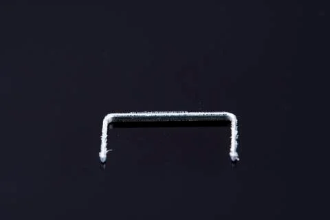 A single isolated tacker on a black background Stock Photos