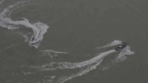 Single Jet Ski Cruising On Gray Water Of Gan River, Side View Stock-Footage 343548020