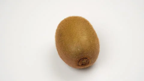 Single Kiwi Fruit Spinning 360 Loop Isolated on White Background Stock Footage 319914014