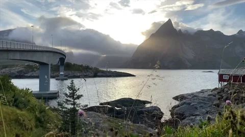 Single lane bridge connecting a small fishing village on Lofoten Islands. Stock Footage 201459729