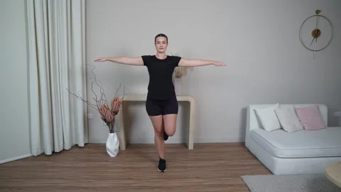 Single Leg Stance with Arms Out Stock Footage 314189079