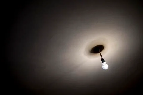 Single Light Bulb on the Ceiling Stock Photos