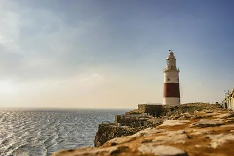 Single lighthouse towering over observation point Stock Photos