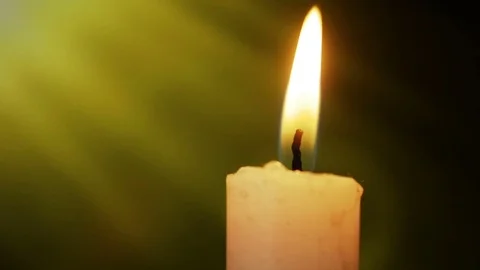 Single lit candle with quite flame Видео 82400084