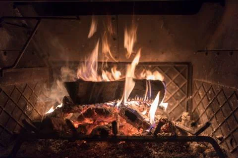 A single log a blaze Stock Photos