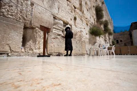 Single man praying Stock Photos