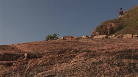 Single man on a rock - September 7th, 2010 - Rio de Janeiro, Brazil Stock Footage 315786062