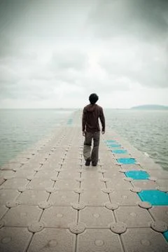 Single man walk Stock Photos