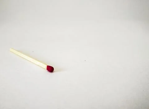 A single Matchstick with white background Stock Photos