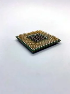 Single microprocessor with pins up closeup view isolated on white Stockfoto's