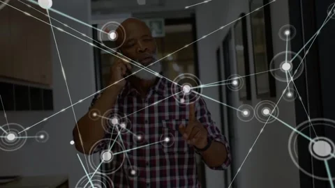 Single node appearing AR net enveloping man walking on phone concentrating Video stock 332428704