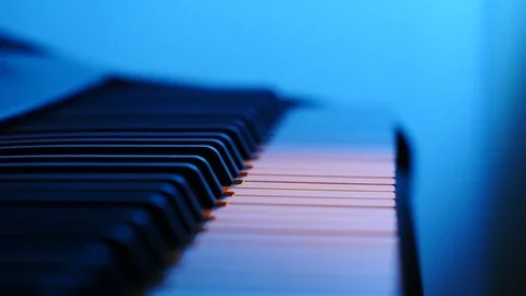 Single Note on the Colored Piano Synthesizer Keyboard Stock Footage 71361456