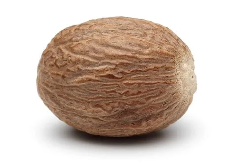Single Nutmeg on white background Stock Photos