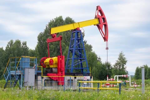 Single oil pumpjack Stock Photos