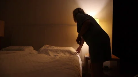 single-older-woman-lying-bed-footage-145852634_iconl.jpeg