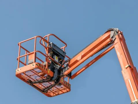 Single Orange Cherry Picker Stock Photos