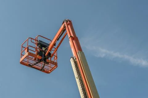 Single Orange Extended Cherry Picker Stock Photos
