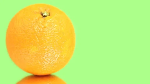 Single Orange on greenscreen Stock Footage 8991806