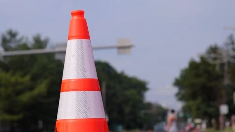 Single orange traffic cone close 動画素材 92828148