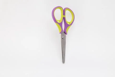 Single Pair of Closed Metal Scissors Lying on a White Background Stock Photos
