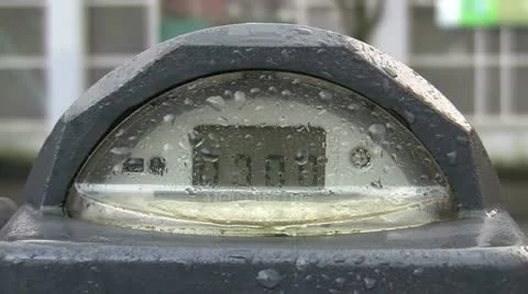 Single Parking Meter Covered In Water Droplets Stock Footage 16440378
